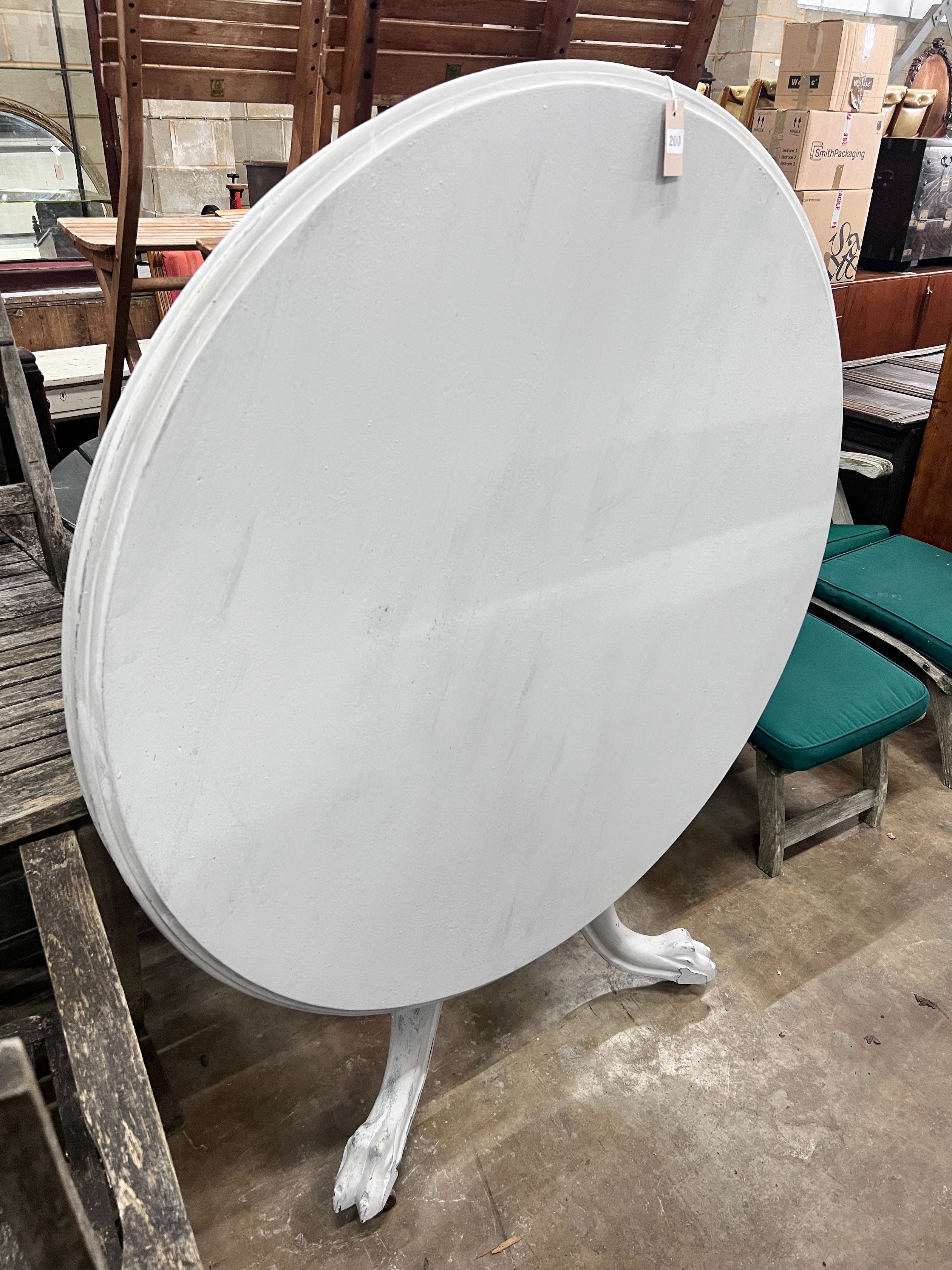 A white painted Victorian mahogany breakfast table, diameter 117cm *Please note the sale commences at 9am.
